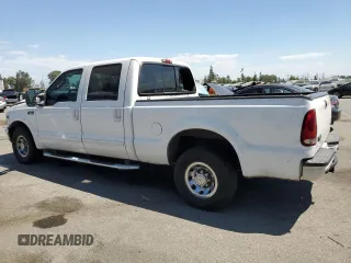 2003 Ford Super Duty F-250 XL with VIN 1FTNW20S43EA50117, listed as a Copart auction lot 70412844 with 224,403 mi miles and Salvage Title. Bid and sale history available at carsss.com. Image 2.