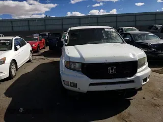 2012 Honda Ridgeline Sport z VIN 5FPYK1F72CB451788, wystawiony jako Copart lot #77704254 z przebiegiem 153 788 mil mil oraz Szkoda całkowita • Salvage title. Historia ofert i sprzedaży dostępna na DreamBid. Obrazek 11.