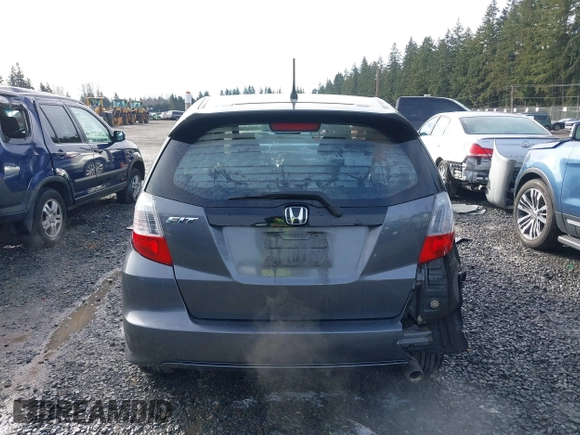 2011 Honda Fit Sport z VIN JHMGE8H54BC000162, wystawiony jako IAAI lot #41665321 z przebiegiem 154 531 mil mil oraz . Historia ofert i sprzedaży dostępna na DreamBid. Obrazek 17.