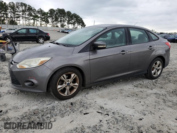2014 Ford Focus SE with VIN 1FADP3F23EL359605, listed as a Copart auction lot 53696465 with 139,884 mi miles and Salvage Title. Bid and sale history available at DreamBid. Image 1.