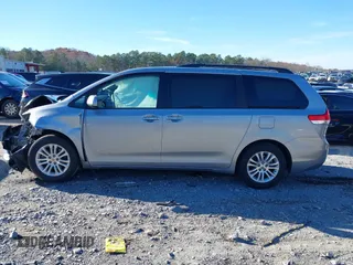 2011 Toyota Sienna XLE AAS with VIN 5TDYK3DC9BS103193, listed as a IAAI auction lot 41073036 with 175,474 mi miles and . Bid and sale history available at DreamBid. Image 14.
