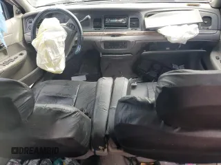 2000 Ford Crown Victoria LX с VIN 2FAFP74W1YX130479, выставлен на аукционе Copart как лот 53387815 с пробегом 166 089 миль миль и На запчасти • Non repairable. История ставок и продаж доступна на DreamBid. Изображение 8.