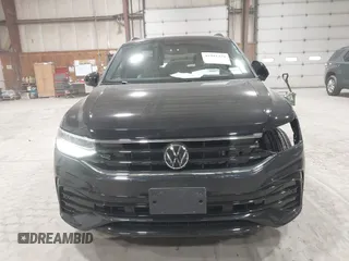 2024 Volkswagen Tiguan SE R-Line Black with VIN 3VV8B7AX8RM103700, listed as a IAAI auction lot 41991238 with 5,084 mi miles and . Bid and sale history available at DreamBid. Image 12.