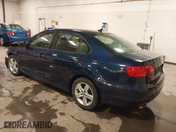 2012 Volkswagen Jetta Sedan TDI with VIN 3VW3L7AJ8CM378733, listed as a IAAI auction lot 41571197 with 151,159 mi miles. Bid and sale history available at carsss.com. Image 3.