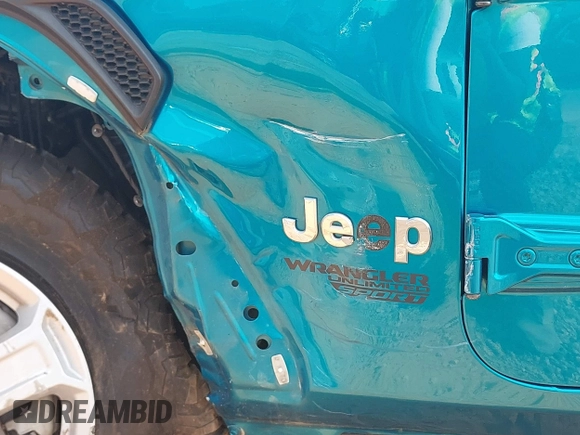 2020 Jeep Wrangler Unlimited Sport z VIN 1C4HJXDG4LW331133, wystawiony jako IAAI lot #42154246 z przebiegiem 87 668 mil mil oraz . Historia ofert i sprzedaży dostępna na DreamBid. Obrazek 19.
