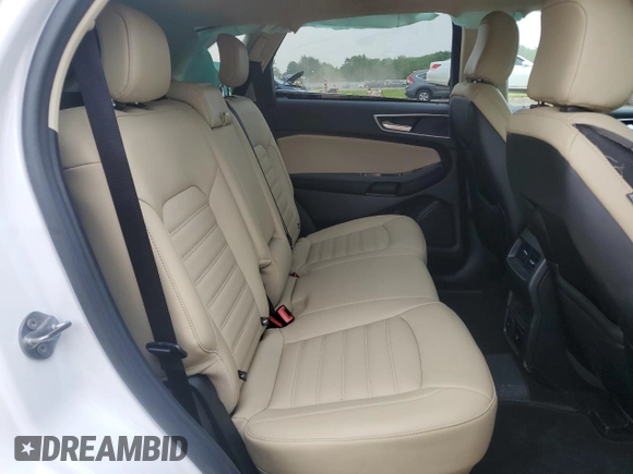 2020 Ford Edge SEL z VIN 2FMPK4J95LBB21392, wystawiony jako Copart lot #60912275 z przebiegiem 82 527 mil mil oraz Szkoda całkowita • Salvage title. Historia ofert i sprzedaży dostępna na DreamBid. Obrazek 11.
