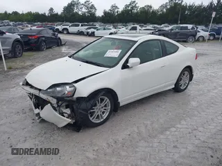 2005 Acura RSX with VIN JH4DC54825S002803, listed as a IAAI auction lot 41903686 with 112,272 mi miles. Bid and sale history available at carsss.com. Image 2.