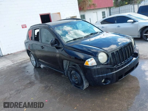 2007 Jeep Compass Sport with VIN 1J8FT47W57D119595, listed as a IAAI auction lot 41782027 with 223,203 mi miles. Bid and sale history available at carsss.com. Image 1.