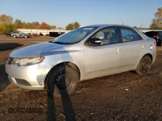 2010 Kia Forte EX with VIN KNAFU4A27A5812872, listed as a Copart auction lot 76876404 with 158,403 mi miles and Clean Title. Bid and sale history available at carsss.com. Image 1.