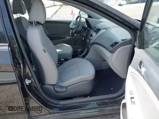 2015 Hyundai Accent Sport with VIN KMHCU5AE5FU233054, listed as a IAAI auction lot 41932298 with 70,278 mi miles. Bid and sale history available at carsss.com. Image 5.