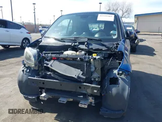 2016 Smart fortwo Passion z VIN WMEFJ5DA4GK067126, wystawiony jako IAAI lot #41559385 z przebiegiem 79 540 mil mil oraz . Historia ofert i sprzedaży dostępna na DreamBid. Obrazek 6.