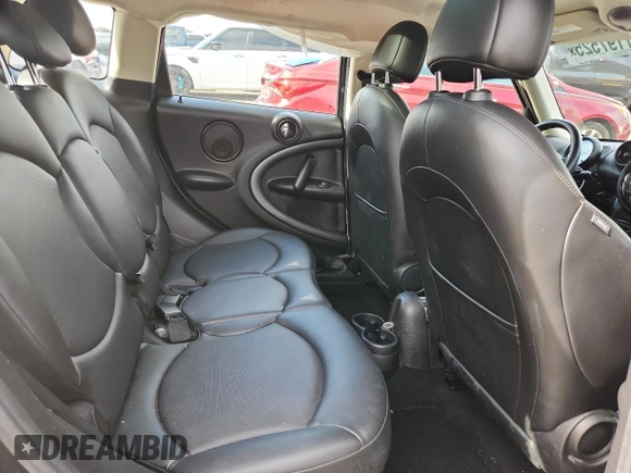 2014 MINI Countryman S with VIN WMWZC3C56EWP25479, listed as a Copart auction lot 61197525 with 101,146 mi miles and Salvage title. Bid and sale history available at DreamBid. Image 10.