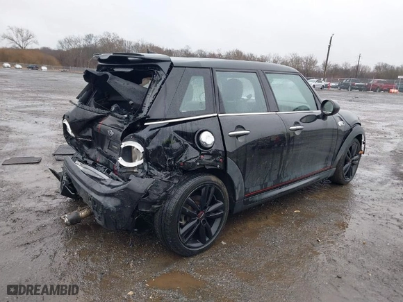 2018 MINI Hardtop 4 Door Cooper S with VIN WMWXU3C58J2F51097, listed as a IAAI auction lot 41567892 with 133542 miles. Bid and sale history available at carsss.com. Image 4.