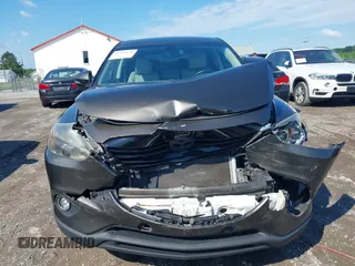 2015 Mazda CX-9 Grand Touring z VIN JM3TB3DV8F0465155, wystawiony jako IAAI lot #42366636 z przebiegiem 125 407 mil mil oraz . Historia ofert i sprzedaży dostępna na DreamBid. Obrazek 12.