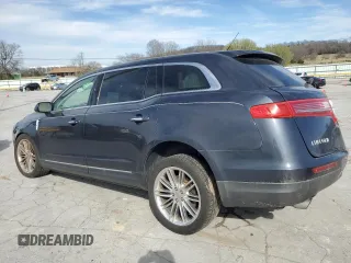2014 Lincoln MKT EcoBoost with VIN 2LMHJ5AT1EBL57487, listed as a Copart auction lot 50182645 with 138,743 mi miles and Salvage Title. Bid and sale history available at DreamBid. Image 2.