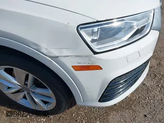 2018 Audi Q3 Premium with VIN WA1BCCFS8JR001155, listed as a IAAI auction lot 41157028 with 83,769 mi miles. Bid and sale history available at carsss.com. Image 18.