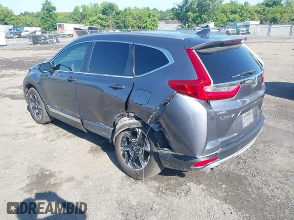 2018 Honda CR-V Touring z VIN 5J6RW2H93JL004834, wystawiony jako IAAI lot #42351364 z przebiegiem 63 746 mil mil oraz . Historia ofert i sprzedaży dostępna na DreamBid. Obrazek 3.