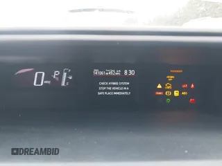 2015 Toyota Prius One z VIN JTDKDTB32F1575905, wystawiony jako IAAI lot #42152447 z przebiegiem 141 061 mil mil oraz . Historia ofert i sprzedaży dostępna na DreamBid. Obrazek 7.