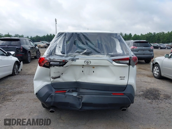 2019 Toyota RAV4 XLE with VIN JTMP1RFV6KD515454, listed as a IAAI auction lot 42618019 with 85,868 mi miles and . Bid and sale history available at DreamBid. Image 16.
