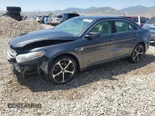 2015 Ford Taurus SEL with VIN 1FAHP2E87FG183122, listed as a Copart auction lot 62878955 with 94,374 mi miles and Salvage title. Bid and sale history available at DreamBid. Image 1.