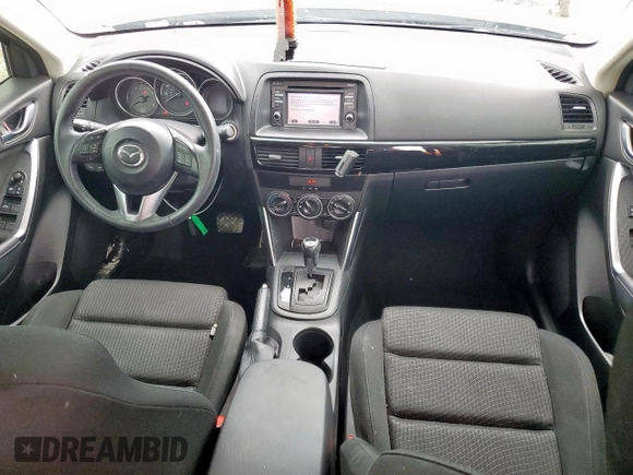 2014 Mazda CX-5 Touring z VIN JM3KE2CY7E0308580, wystawiony jako Copart lot #60565835 z przebiegiem 92 708 mil mil oraz Szkoda całkowita • Salvage title. Historia ofert i sprzedaży dostępna na DreamBid. Obrazek 8.