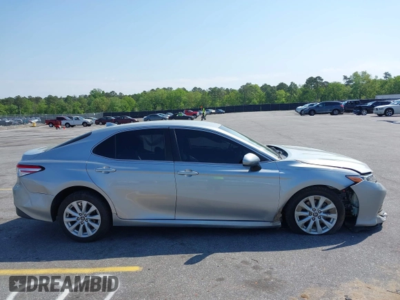 2020 Toyota Camry LE with VIN 4T1C11AK9LU341762, listed as a IAAI auction lot 42001577 with 84,991 mi miles and . Bid and sale history available at DreamBid. Image 13.