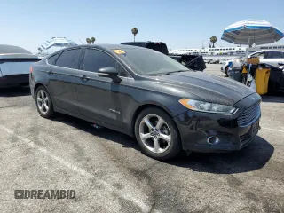 2014 Ford Fusion SE Hybrid with VIN 3FA6P0LU2ER185685, listed as a Copart auction lot 62941405 with 173,939 mi miles and Clean title. Bid and sale history available at DreamBid. Image 4.