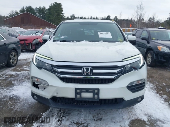 2017 Honda Pilot EX-L with VIN 5FNYF6H52HB015651, listed as a IAAI auction lot 41538814 with 121,433 mi miles and . Bid and sale history available at DreamBid. Image 12.