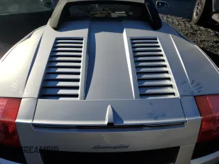 2007 Lamborghini Gallardo z VIN ZHWGU22T57LA05137, wystawiony jako Copart lot #78841294 z przebiegiem 5504 mil mil oraz Szkody całkowita. Historia ofert i sprzedaży dostępna na DreamBid. Obrazek 11.