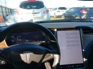 2020 Tesla Model S Long Range with VIN 5YJSA1E26LF410779, listed as a IAAI auction lot 41241192 with 68,764 mi miles and . Bid and sale history available at DreamBid. Image 19.