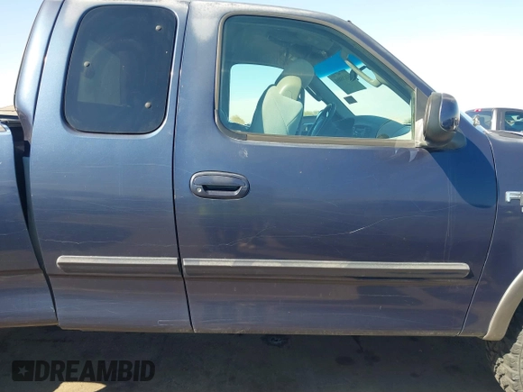 2003 Ford F-150 XL with VIN 1FTRX18WX3NA22323, listed as a IAAI auction lot 41635869 with 129,029 mi miles. Bid and sale history available at carsss.com. Image 13.