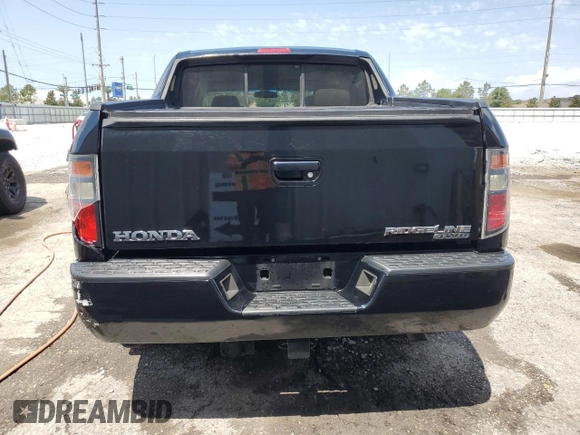 2006 Honda Ridgeline RTS z VIN 2HJYK16406H541241, wystawiony jako Copart lot #55735595 z przebiegiem 248 245 mil mil oraz Szkoda całkowita • Salvage title. Historia ofert i sprzedaży dostępna na DreamBid. Obrazek 6.