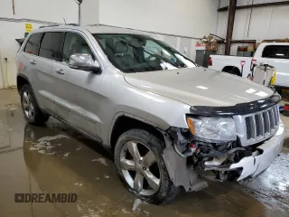 2013 Jeep Grand Cherokee Overland with VIN 1C4RJFCG2DC622345, listed as a Copart auction lot 49640325 with 192,144 mi miles and Salvage Title. Bid and sale history available at carsss.com. Image 4.
