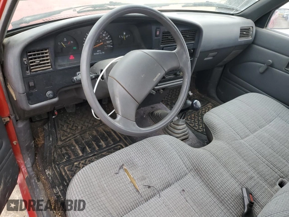 1991 Toyota Pickup DX z VIN JT4RN01P0M7042332, wystawiony jako Copart lot #42408835 z przebiegiem 211 481 mil mil oraz Szkoda całkowita • Salvage title. Historia ofert i sprzedaży dostępna na DreamBid. Obrazek 8.