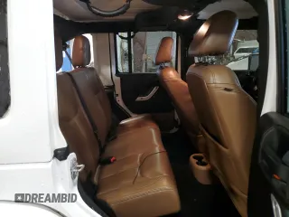 2015 Jeep Wrangler Unlimited Wrangler X with VIN 1C4HJWEG7FL671259, listed as a Copart auction lot 52334325 with 81,244 mi miles and Clean title. Bid and sale history available at DreamBid. Image 11.