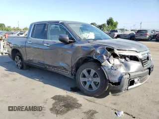 2020 Honda Ridgeline RTL-E with VIN 5FPYK3F76LB010841, listed as a Copart auction lot 67267635 with 53,055 mi miles and Salvage title. Bid and sale history available at DreamBid. Image 4.