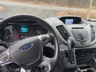 2015 Ford Transit Passenger XL with VIN 1FBZX2YGXFKA96110, listed as a Copart auction lot 84711064 with 169,835 mi miles and Clean Title. Bid and sale history available at DreamBid. Image 9.