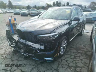 2022 BMW X5 xDrive45e with VIN 5UXTA6C01N9M84108, listed as a Copart auction lot 65150782 with 5,977 mi miles. Bid and sale history available at carsss.com. Image 2.