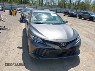 2019 Toyota Camry LE with VIN 4T1B11HK8KU289721, listed as a IAAI auction lot 42021107 with 69,828 mi miles and . Bid and sale history available at DreamBid. Image 12.