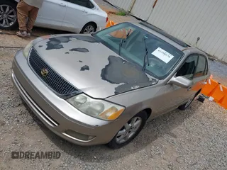 2000 Toyota Avalon XL z VIN 4T1BF28B2YU048155, wystawiony jako IAAI lot #42350570 z przebiegiem 254 043 mil mil oraz . Historia ofert i sprzedaży dostępna na DreamBid. Obrazek 2.