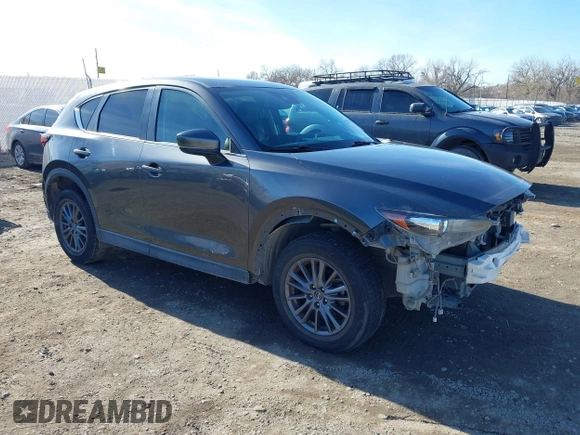 2019 Mazda CX-5 Touring with VIN JM3KFBCM7K0611896, listed as a IAAI auction lot 41732111 with 90,826 mi miles. Bid and sale history available at carsss.com. Image 1.