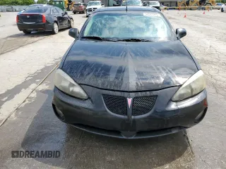 2005 Pontiac Grand Prix z VIN 2G2WS542651161577, wystawiony jako Copart lot #56522945 z przebiegiem 241 430 mil mil oraz Szkody całkowita. Historia ofert i sprzedaży dostępna na DreamBid. Obrazek 5.
