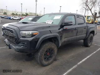 2019 Toyota Tacoma 4WD SR with VIN 5TFCZ5AN8KX205408, listed as a IAAI auction lot 41521901 with 63,387 mi miles. Bid and sale history available at carsss.com. Image 20.
