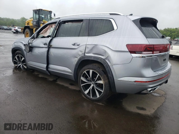 2024 Volkswagen Atlas SEL Premium R-Line with VIN 1V2FR2CA9RC555829, listed as a Copart auction lot 58841885 with 6,535 mi miles and Salvage title. Bid and sale history available at DreamBid. Image 2.