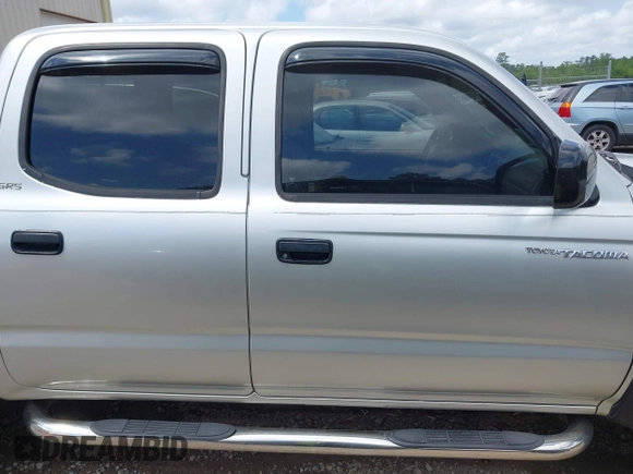 2003 Toyota Tacoma PreRunner z VIN 5TEGN92N23Z218412, wystawiony jako IAAI lot #41994813 z przebiegiem 334 799 mil mil oraz . Historia ofert i sprzedaży dostępna na DreamBid. Obrazek 13.