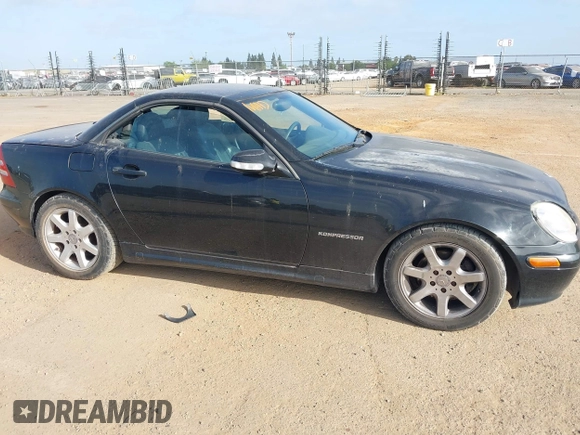 2003 Mercedes-Benz SLK-Class 2.3L with VIN WDBKK49F33F273872, listed as a IAAI auction lot 42111682 with 143,969 mi miles. Bid and sale history available at carsss.com. Image 6.