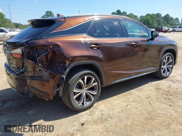 2016 Lexus RX 350 with VIN 2T2ZZMCA3GC005018, listed as a IAAI auction lot 42276197 with 136,692 mi miles and . Bid and sale history available at DreamBid. Image 4.