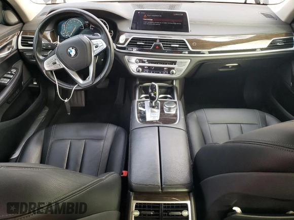 2018 BMW 7 Series 740i xDrive with VIN WBA7E4C5XJGV24003, listed as a Copart auction lot 71395443 with 63,558 mi miles. Bid and sale history available at carsss.com. Image 8.