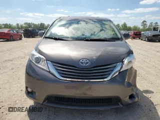 2012 Toyota Sienna XLE AAS with VIN 5TDYK3DCXCS199580, listed as a Copart auction lot 52455405 with 113,259 mi miles and Salvage Title. Bid and sale history available at DreamBid. Image 5.