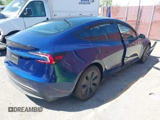 2024 Tesla Model 3 with VIN 5YJ3E1EA3RF758189, listed as a IAAI auction lot 41987653 with 9,423 mi miles. Bid and sale history available at carsss.com. Image 4.
